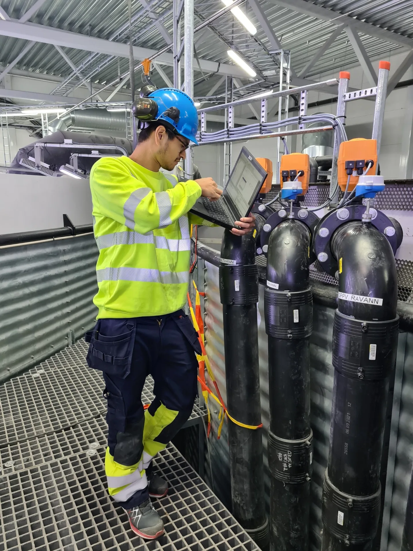 Engineers working at a RAS facility