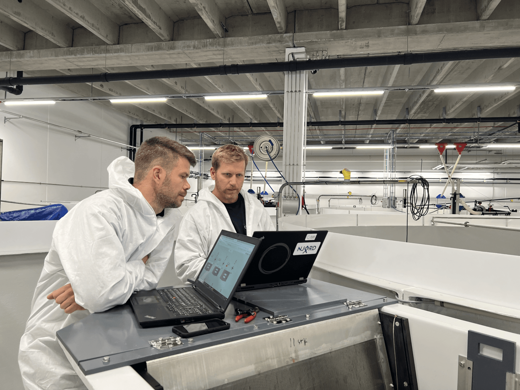 Engineers monitoring RAS systems